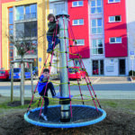 Children On Spiral Carousel